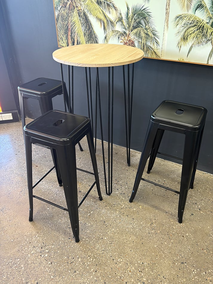 Our black hairpin round cocktail table hired for an event