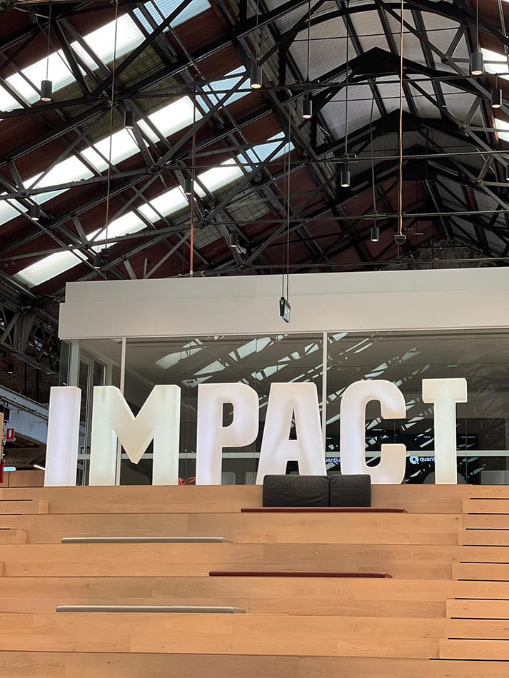 Our glow letters hired to spell the word impact
