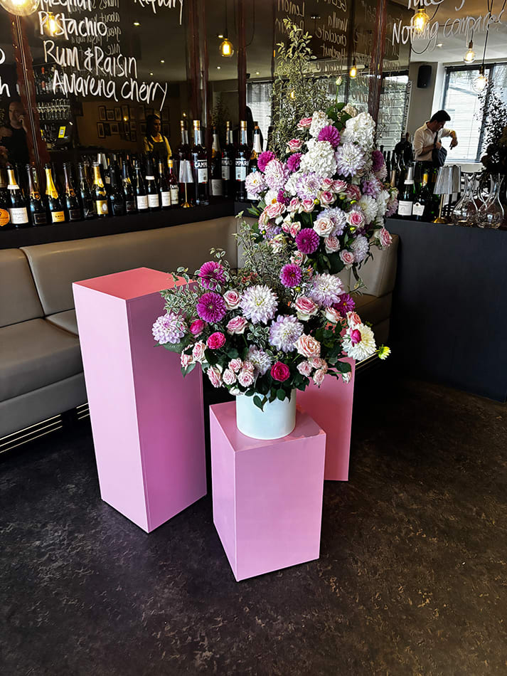 Pink plinths hired to display flowers