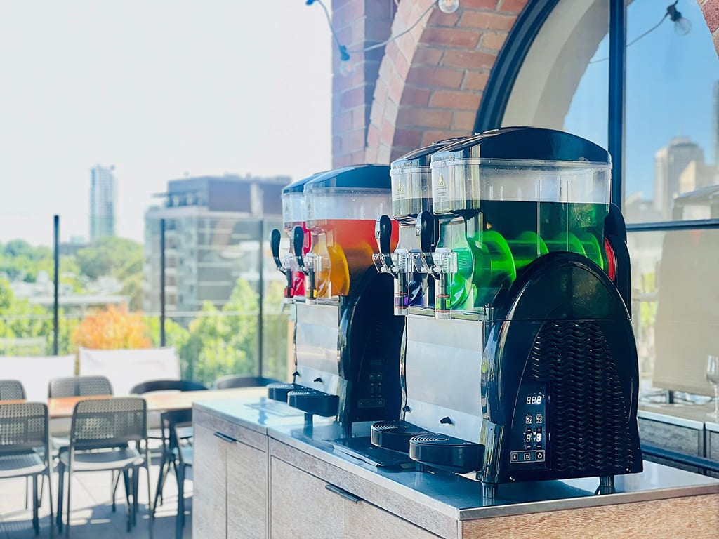 Two twin bowl slushie machines