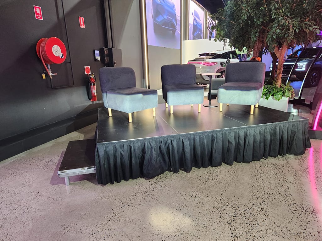 And elevated speakers' stage at a corporate event