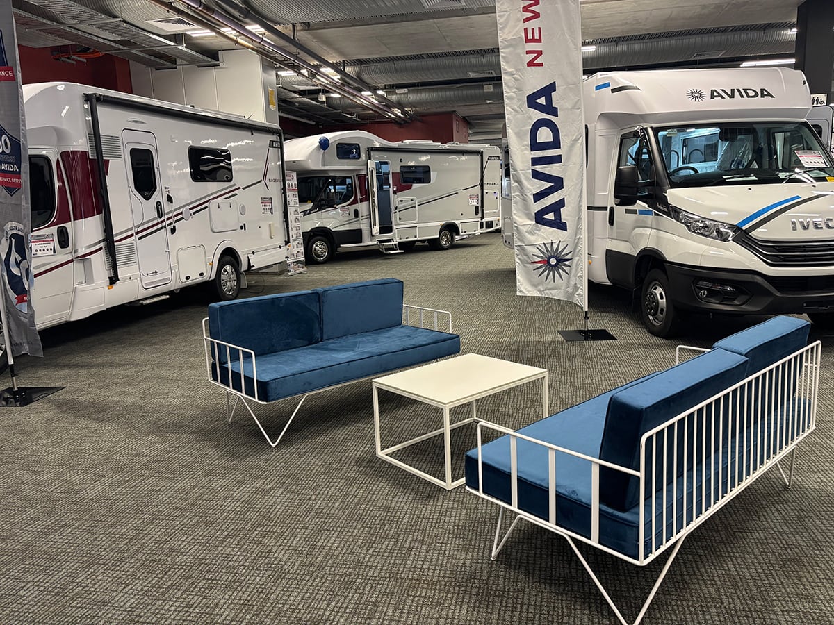 A blue wire sofa lounge hired for a campervan show