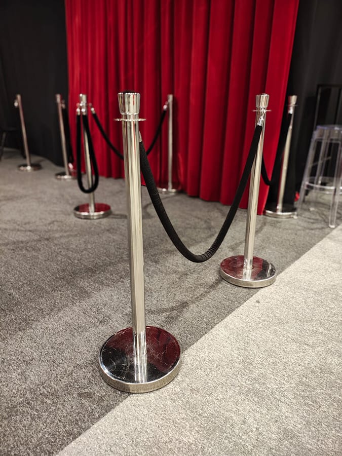 Beautiful chrome bollards with black rope