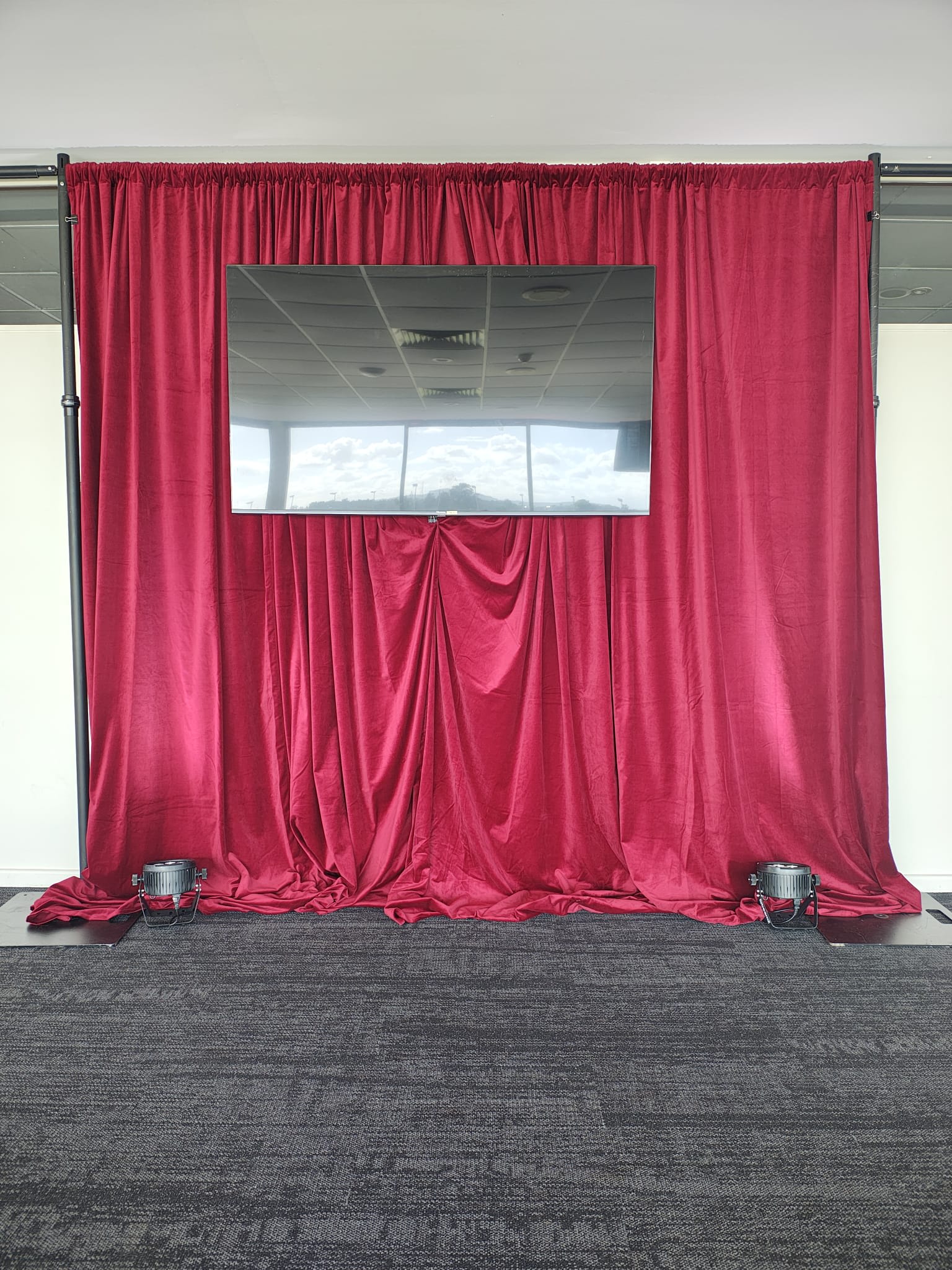 A red velvet drape used on a stage