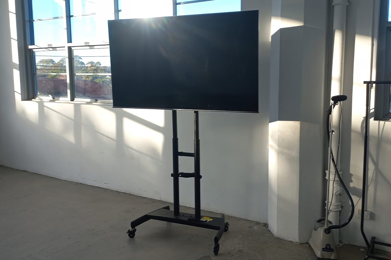 A TV and stand being hired at an event