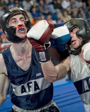 Guy punching in a boxing match