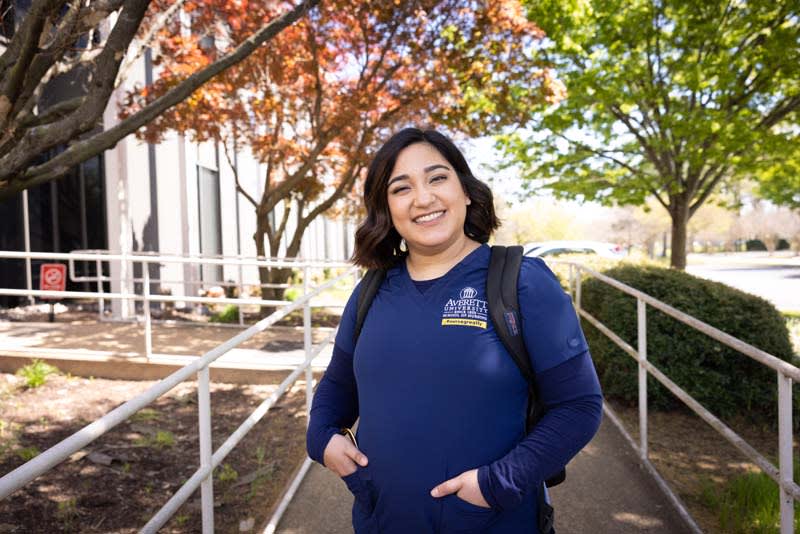 ABSN student smiling outside