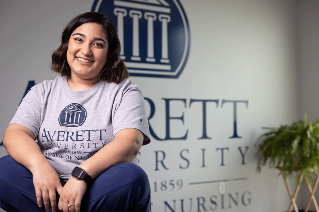 Averett nursing student sitting and smiling