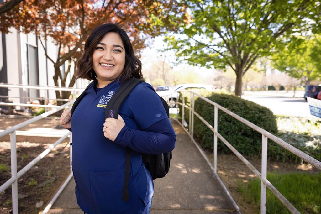 Averett ABSN student standing outside with backpack