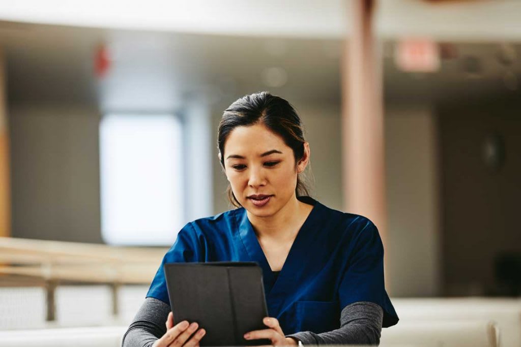 nursing student on tablet