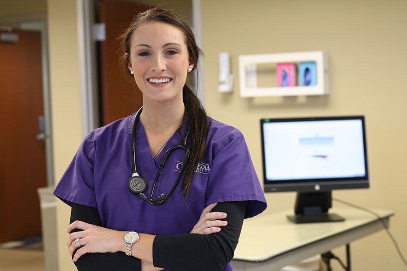 ABSN student standing in hospital