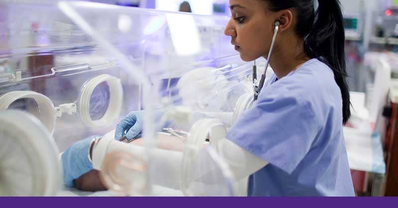 Nurse with stethoscope in NICU