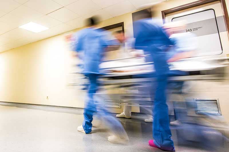 Emergency nurses rushing in hospital