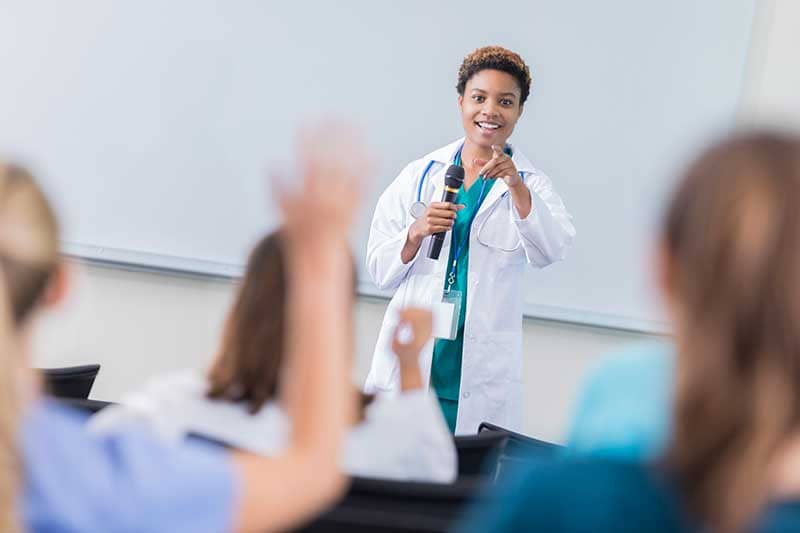 nurse speaking in classroom