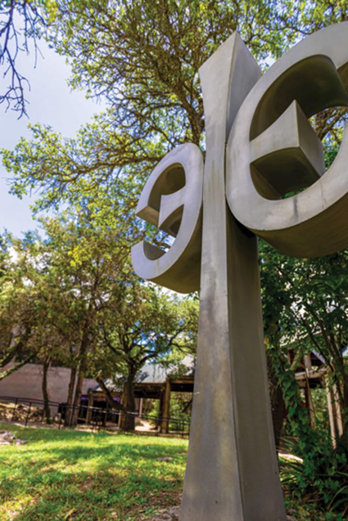 CTX cross statue outside