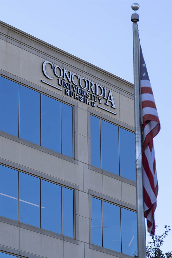 Concordia University Texas logo sign on outside of building