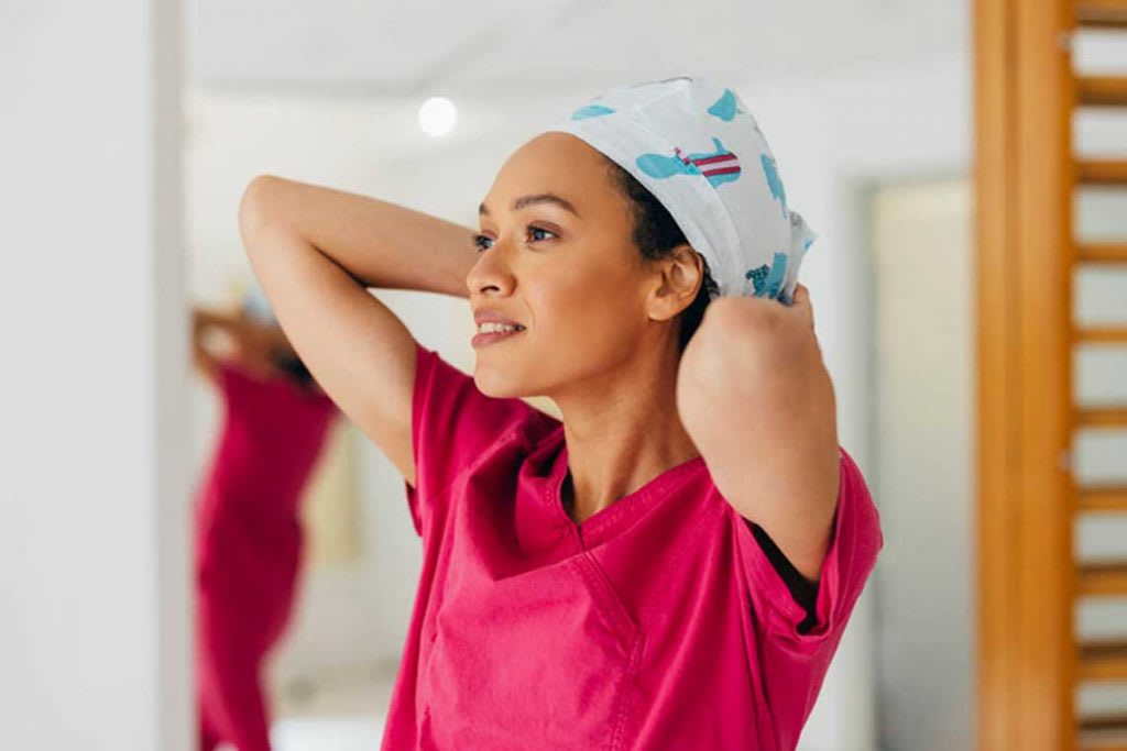 nurse wearing red scrubs