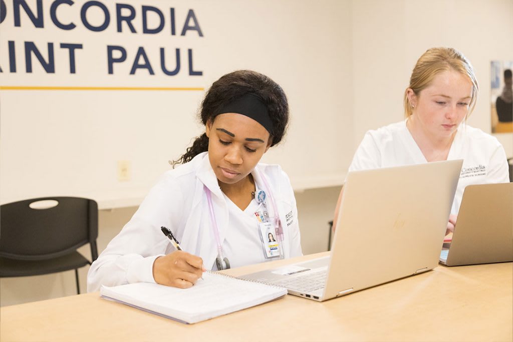 CSP nursing students studying at table