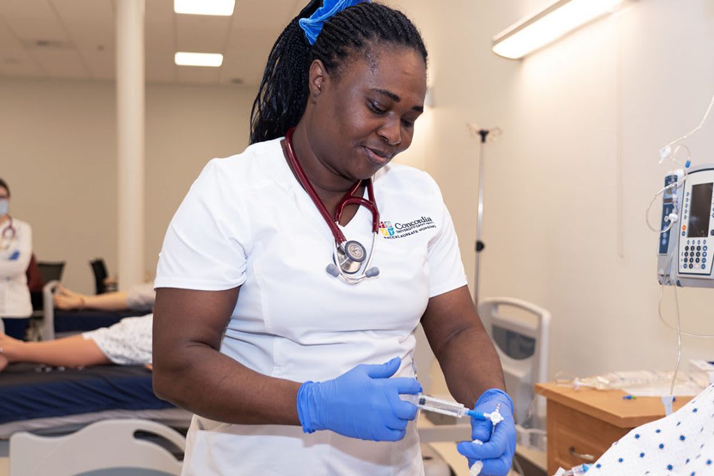 nursing student in sim lab