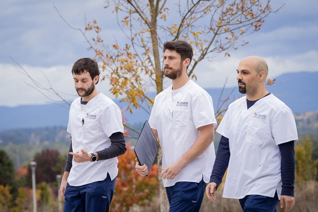 three CSP nursing students walking outside