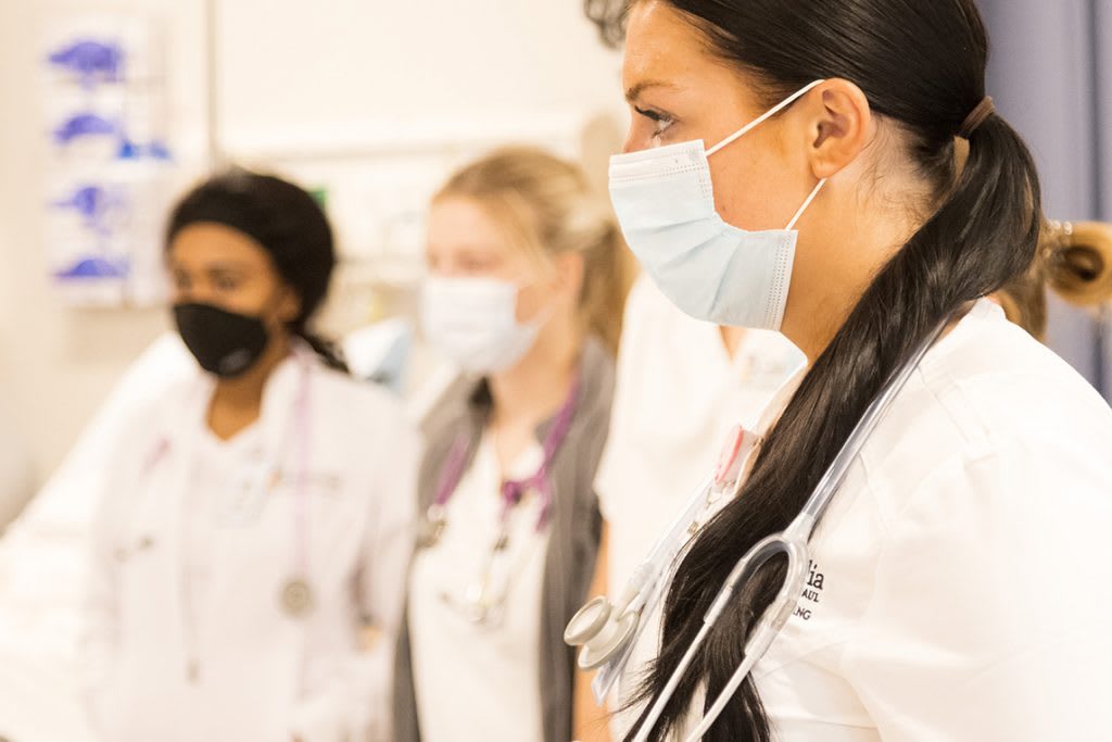 three CSP nursing students standing in lab