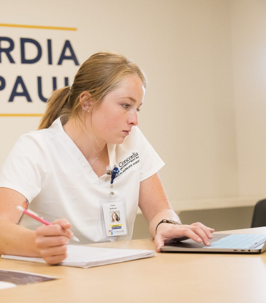 csp nursing student on laptop