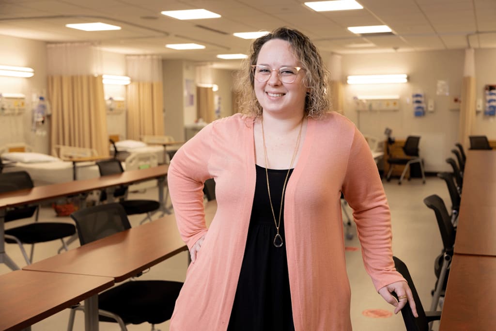 Felician nursing student standing in classroom