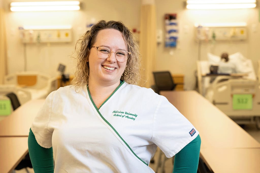 Felician ABSN student standing and smiling