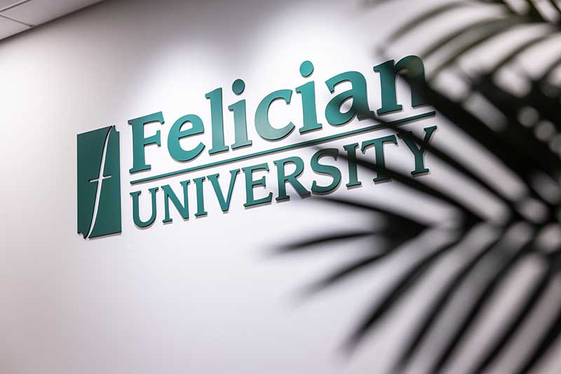 Felician University logo on wall