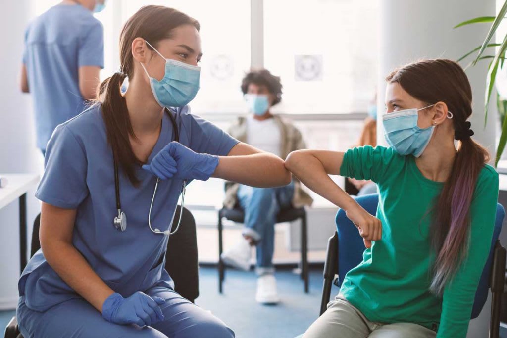 nurse and young patient