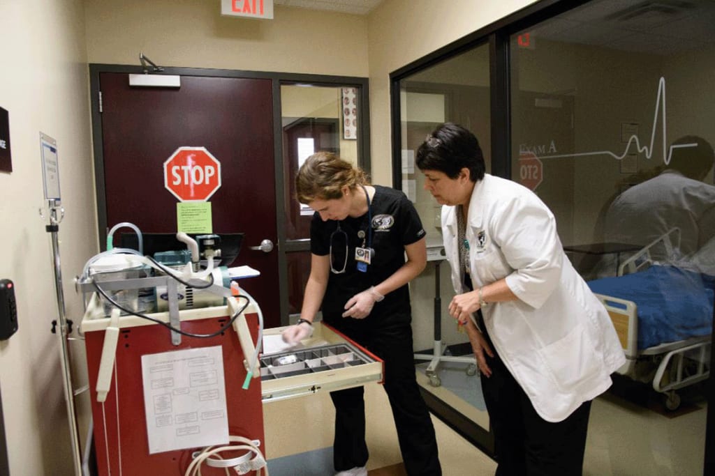 harding nursing student searching for equipment