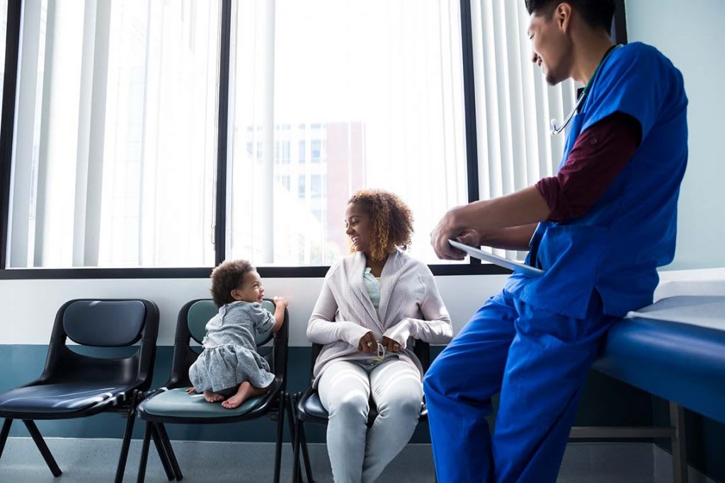 nurse talking with family