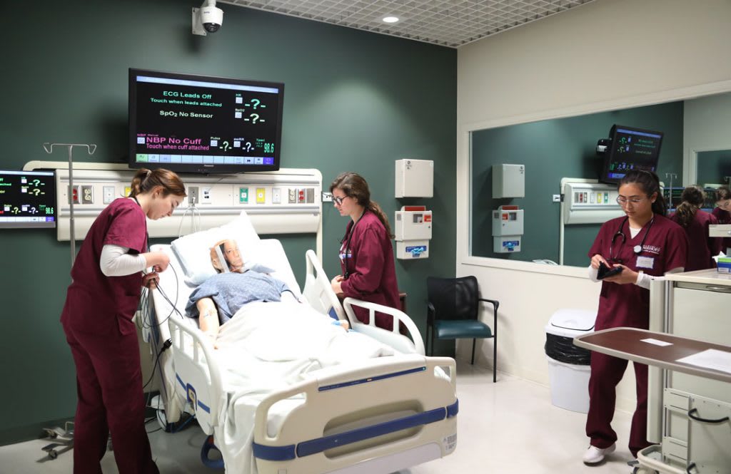 Loyola nursing students in clinical setting