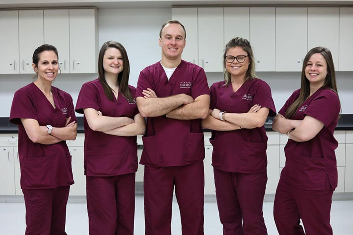 portrait of three Loyola nursing students