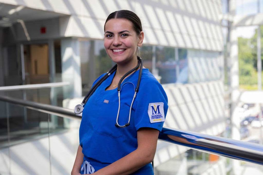 Madonna nurse smiling at camera