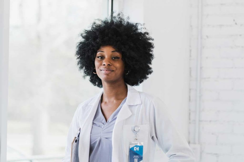 nurse wearing white coat