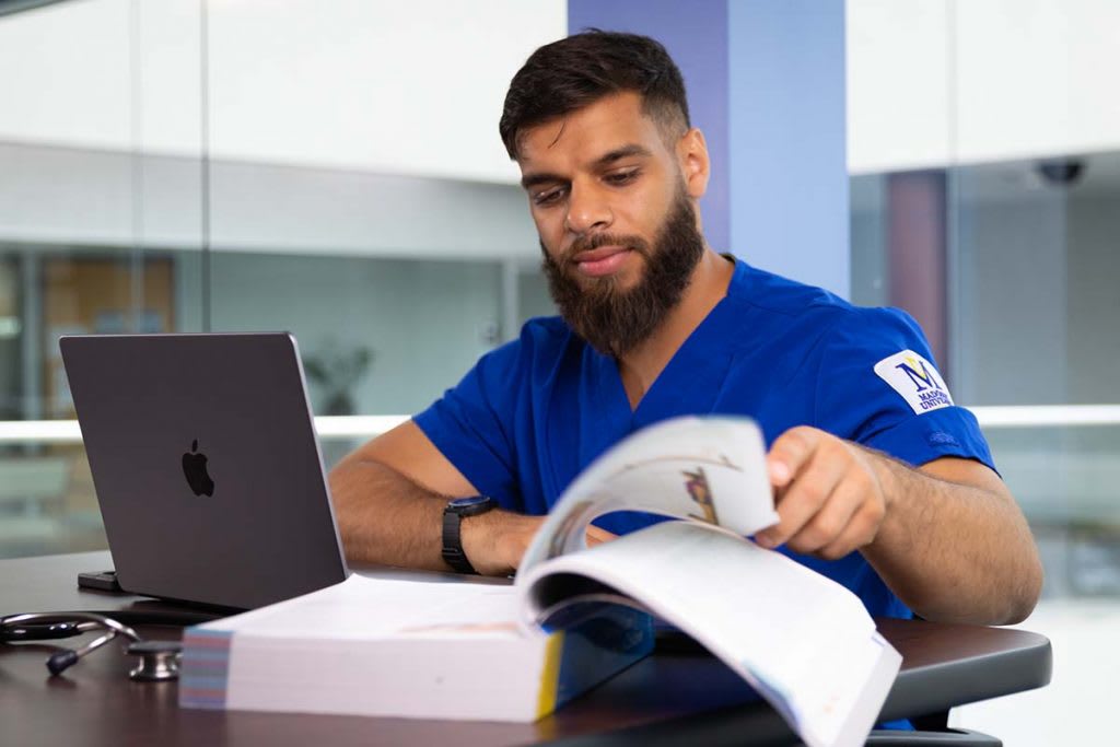 student nurse doing homework