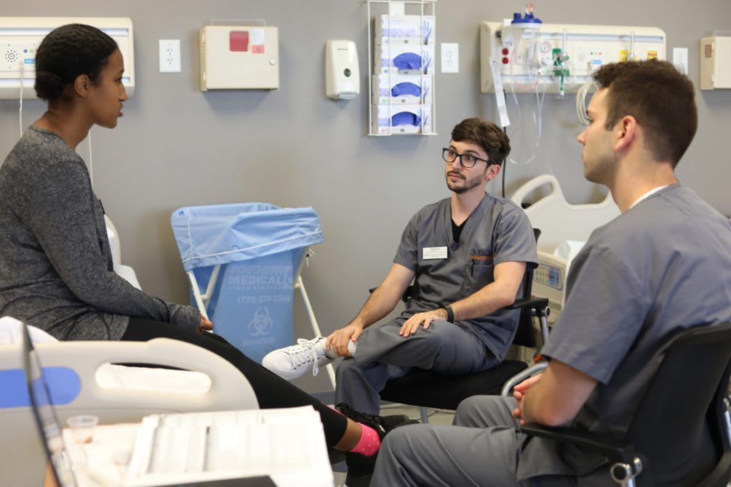 three Mercer nursing students sitting in skills lab