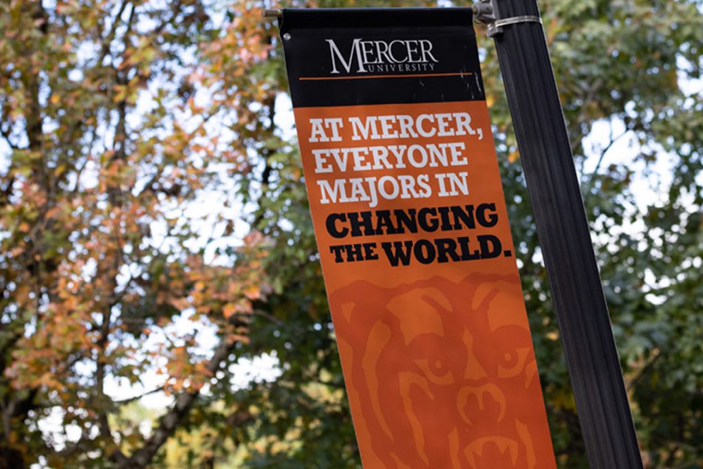 Mercer University campus sign on lamp post