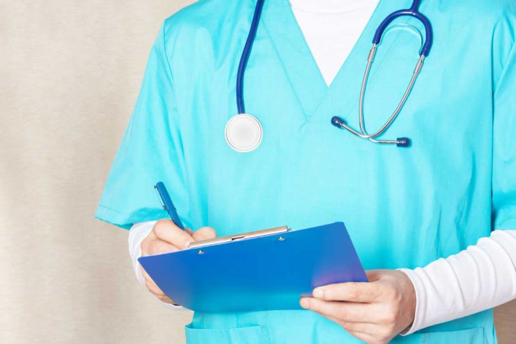 nurse holding clipboard