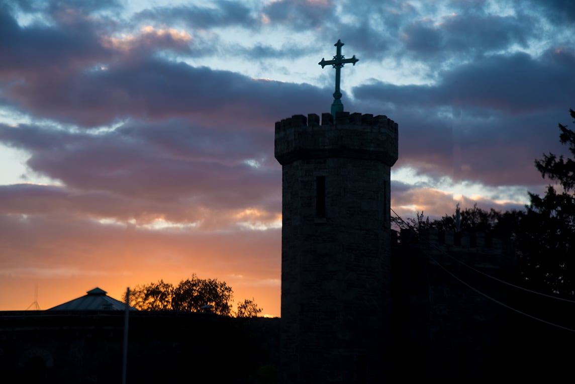 Sunset shot of cross on CMSV building