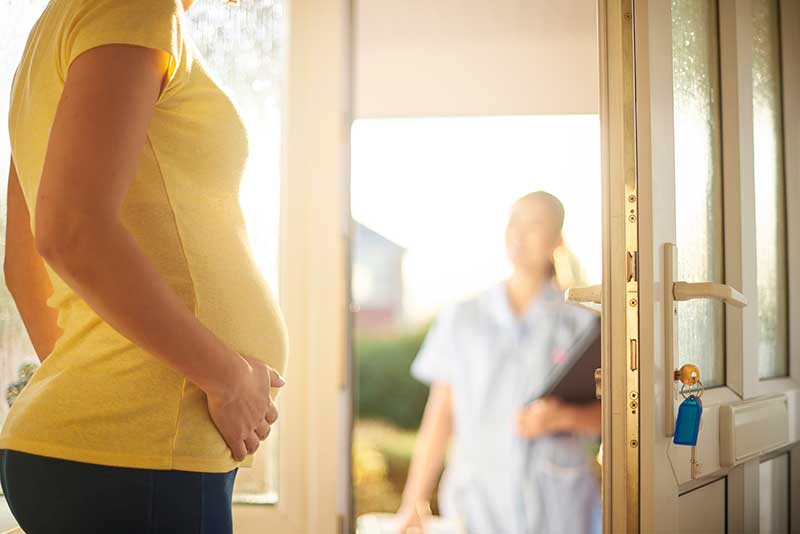 nurse showing up at front door of patient's home