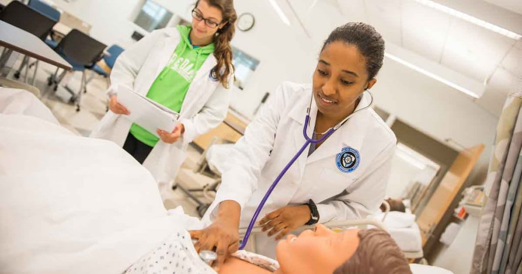 nursing students in sim lab