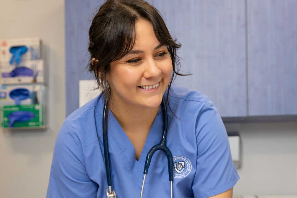 NDMU nursing student wearing stethoscope