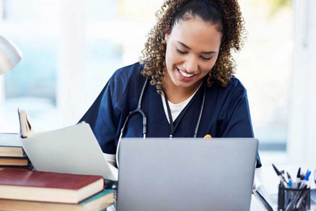 nurse using laptop