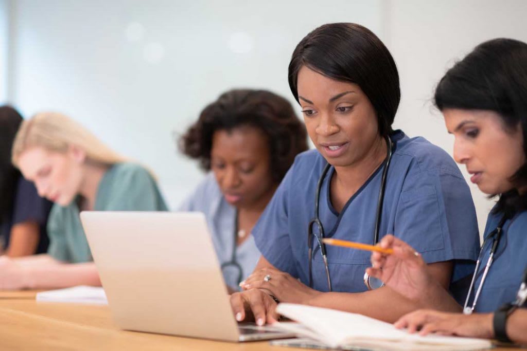 nursing students working