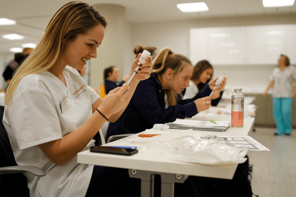 Northeastern ABSN students practicing in skills lab