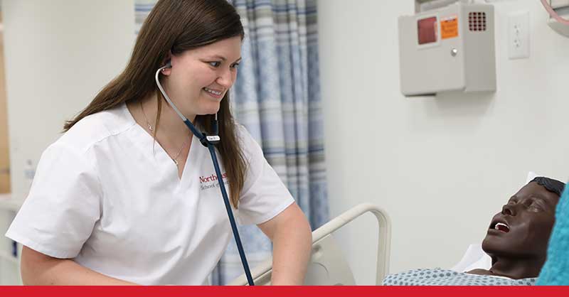 Northeastern ABSN student working in sim lab