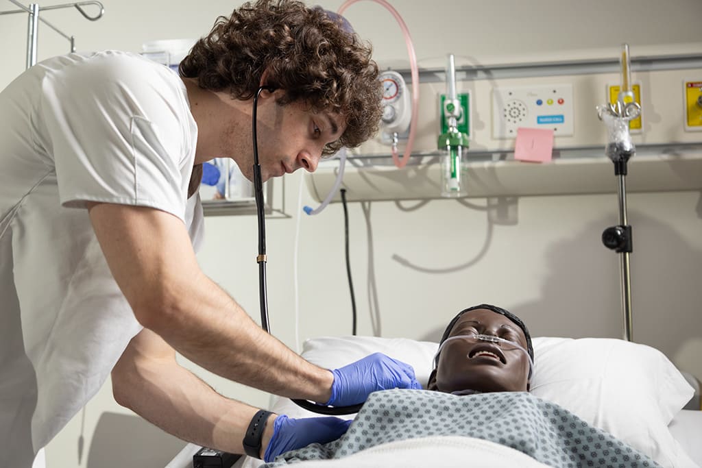 Northeastern nursing student in sim lab