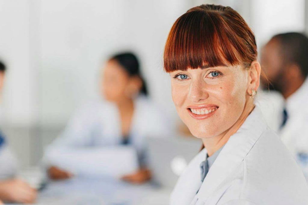 Nurse smiling at camera